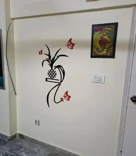 Decorative wall sticker with a pineapple design on a white wall.
