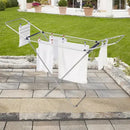 Outdoor drying rack with clothes on a patio area