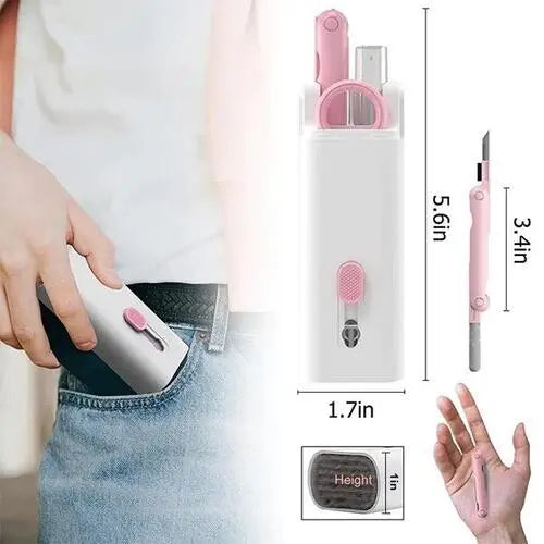 Small white and pink tool set with measurements and a hand holding it.