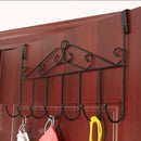 Decorative iron hook rack attached to a wooden cabinet