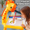 Child using a giraffe-shaped projector drawing board with a colorful drawing on a white background.