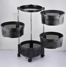 Black tiered stand with circular baskets on a white background