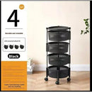 Black multi-tiered rolling cart with wheels on a wooden floor, next to packaging with product details.