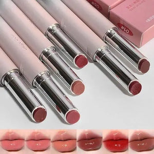 Set of lipsticks with visible shades on a light background