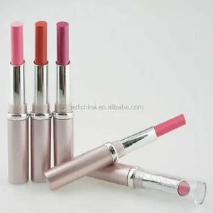 Set of lipsticks with visible shades on a light background