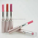 Set of lipsticks with visible shades on a light background