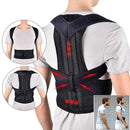 Person wearing a black posture corrector with red accents on a white background