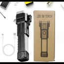 Black LED torch with packaging and USB cable on a white background