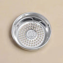 Stainless steel strainer with 'SUS 316' marking on a beige background